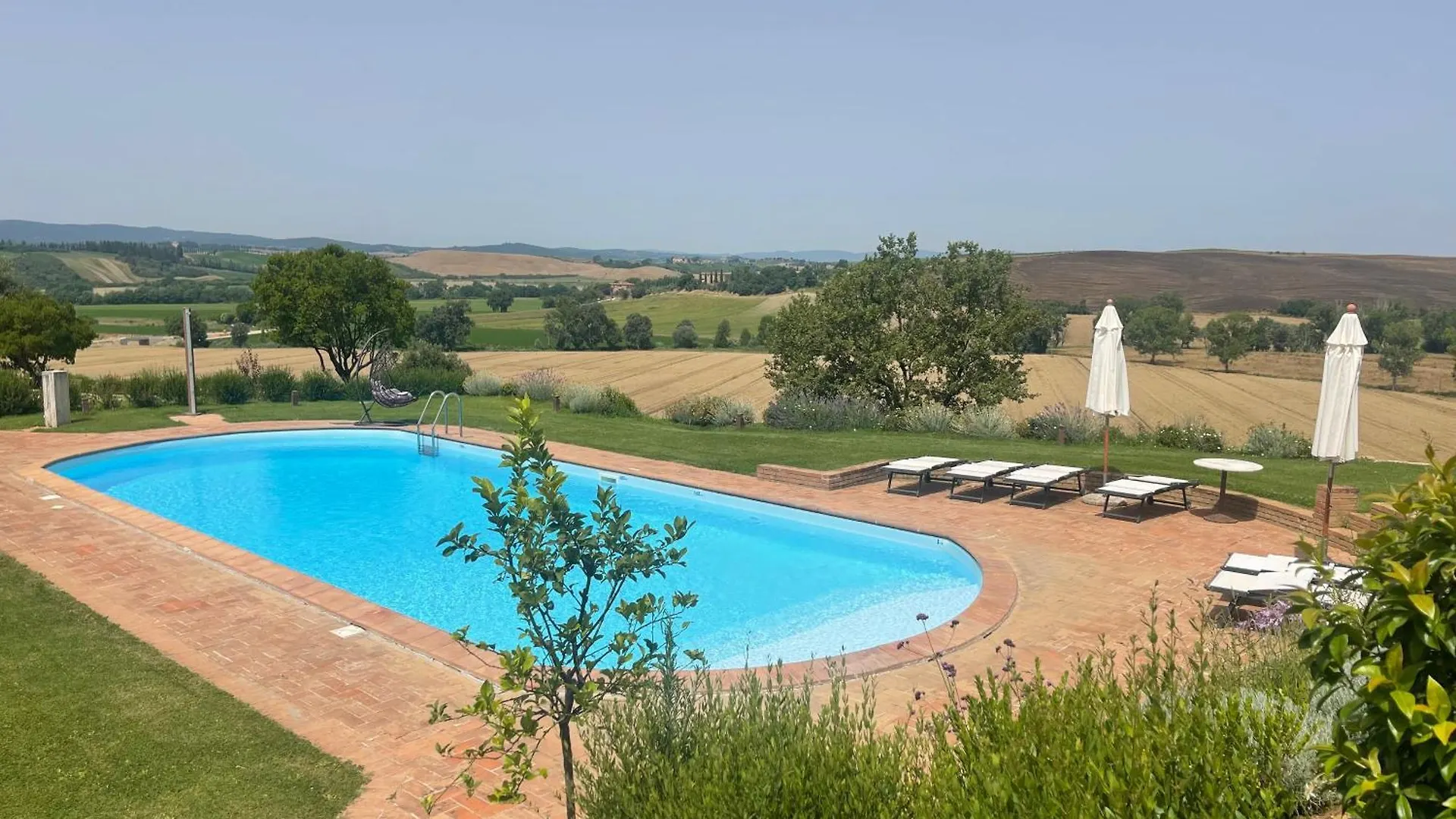 アパート Cottage Con Piscina Immerso Nel Verde Delle Crete Senesi アッシャーノ イタリア